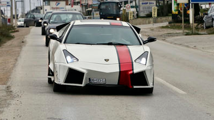 Kosovo car enthusiast Driton Selmani drives his hand made replica Lamborghini thorough the town of Gjilan in Kosovo on Thursday, Oct. 27, 2016. Selmani always wanted some hot wheels but could not afford them. What he had, however, was a workshop and talent for bending and welding metal. so he built himself a Lamborghini.