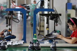 Workers assemble sneakers at a factory in Jinjiang city in southeast China's Fujian province. Private and official surveys show that China's factory activity rose to a two-year high in October 2016, suggesting the world's No. 2 economy is stabilizing.