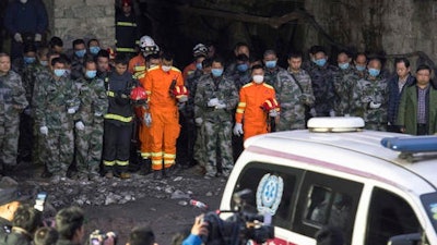 Rescuers mourn for victims at Jinshangou Coal Mine in Chongqing, southwest China. All the coal miners trapped underground in a gas explosion earlier this week have been found dead, state media reported Wednesday, as work safety officials vowed to punish those responsible.