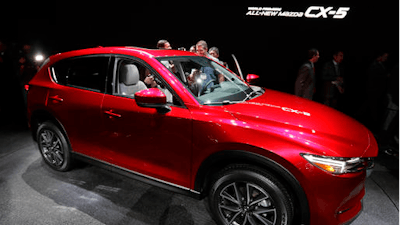 A 2017 Mazda CX-5 is displayed during the Los Angeles Auto Show in Los Angeles, Wednesday, Nov. 16, 2016.