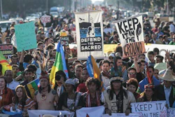 Hundreds protest against climate change and urge world leaders to take action, in a march coinciding with the Climate Conference, known as COP22, taking place in Marrakech, Morocco, Sunday, Nov. 13, 2016.