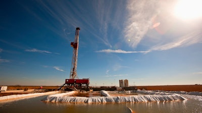 This file photo shows a water pool attached to Robinson Drilling rig No. 4 in Midland County, Texas. An assessment by the U.S. Geological Survey shows that the Wolfcamp Shale in the Midland region could yield another 20 billion barrels of oil.