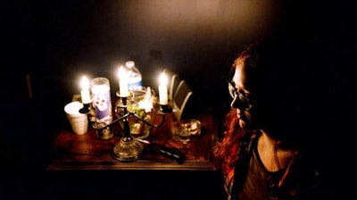 Sarah Talley,19, poses for a portrait during a small gathering, in which people prayed for the Dakota Access oil pipeline protesters in Cannon Ball, ND., on Saturday, Nov. 26, 2016 at Ingress Yugen, a spiritual resource center, in Flint, Mich. 'I think it's important for people in Standing Rock and in Flint to kind of acknowledge each other because we're fighting the same fight, just in different way,' said Talley.