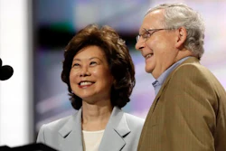 In this July 17, 2016 file photo, former Labor Secretary Elaine Chao and her husband, Senate Majority Leader Mitch McConnell, R-Ky., check out the stage during preparation for the Republican National Convention inside Quicken Loans Arena in Cleveland. President-elect Donald Trump has picked Elaine Chao to become transportation secretary, according to a Trump source.