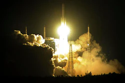 In this photo taken Thursday Nov. 3, 2016, a CZ-5 heavy-lift rocket, the latest in China's Long March series, blasts off from the Wenchang Satellite Launch Center in Wenchang county in south China's Hainan province. China says its plans for a permanent space station remain on track with the successful launch of its new heavy-lift Long March 5 rocket.