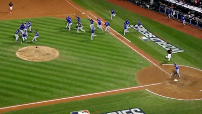 The Chicago Cubs celebrate after Game 7 of the Major League Baseball World Series against the Cleveland Indians Thursday, Nov. 3, 2016, in Cleveland. The Cubs won 8-7 in 10 innings to win the series 4-3.