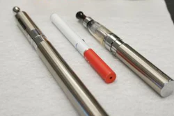 DRI scientists measured concentrations of 12 aldehydes in aerosols produced by three common e-cigarette devices shown here. To determine whether the flavoring additives affected aldehyde production during vaping, five flavored e-liquids were tested in each device. In addition, two unflavored e-liquids were also tested.
