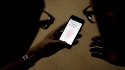 Leading tech companies are increasingly nudging consumers to use their own fingers, faces and eyes as digital key to unlock phones and other gadgets. But there are downsides: Hackers could still steal your fingerprint, or its digital representation. And police may have broader legal powers to make you unlock your phone.