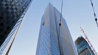 In this photo taken Monday, Sept. 26, 2016, is the 58-story Millennium Tower in San Francisco. San Francisco has sued the developer of the Millennium Tower, a sinking and tilting luxury high-rise, saying the developers knew about the problems but did not disclose the information to potential home buyers as required by law. Millennium Tower was completed eight years ago and so far has sunk 16 inches into the soft soil of San Francisco's crowded Financial District, causing a 2-inch tilt at the base and a 6-inch lean at the top.