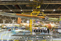 The LM-100J Super Hercules recently completed body mate and wing installation.