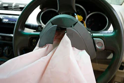 In this Monday, Nov. 7, 2016 photo, the exploded air bag that injured Rabiah binti Ibrahim hangs from the steering wheel in her Honda City in Slim River, Malaysia. Five Malaysians have died in accidents linked to faulty Takata air bags that are at the center of one of the world’s largest auto recalls.