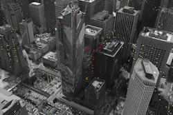 The image provided by the European Space Agency ESA on Thursday, Nov. 24, 2016, shows the Millennium Tower in San Francisco on the base of modified Copernicus Sentinel satellite data. The European Space Agency has released satellite data that shows the skyscraper in San Francisco's financial district continuing to sink at a steady rate, and perhaps faster than previously known. The colored dots represent targets observed by the radar. The colour scale ranges from 40 mm a year away from radar (red) to 40 mm a year towards radar (blue). Green represents stable targets.