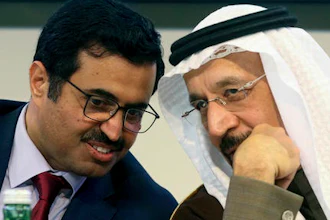 Mohammed Bin Saleh Al-Sada, Minister of Energy and Industry of Qatar and President of the OPEC Conference, left, and Khalid Al-Falih, Minister of Energy, Industry and Mineral Resources of Saudi Arabia attend a news conference after a meeting of the Organization of the Petroleum Exporting Countries, OPEC, at their headquarters in Vienna, Austria, Saturday, Dec. 10, 2016.