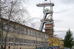 A view of the entrance to the Rudna copper mine with a miners flag at half-staff, in Polkowice, Poland.