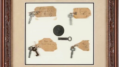 This photo provided by Heritage Auctions shows Thomas A. Edison: Keys to His Menlo Park Laboratory on display. Six keys in all from the famous inventor's Menlo Park home and work place will be auctioned Saturday, Dec. 3, 2016 in Dallas, along with five lightbulbs, including two that he created. Heritage Auctions will open the bidding on the two lots.
