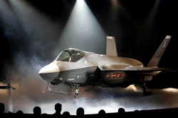 In this July 7, 2006, file photo, the Lockheed Martin F-35 Joint Strike Fighter is shown after it was unveiled in a ceremony in Fort Worth, Texas. Shares of Lockheed Martin fell Monday, Dec. 12, 2016, as President-elect Donald Trump tweeted that making F-35 fighter planes is too costly and that he will cut 'billions' in costs for military purchases.