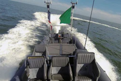 An unmanned rigid-hull inflatable boat operates autonomously during an ONR-sponsored demo of swarmboat technology.