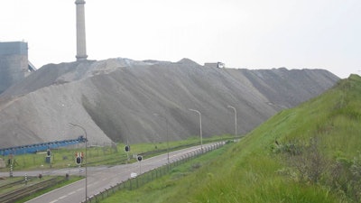 A stockpile of steel slag, next to a steel factory.