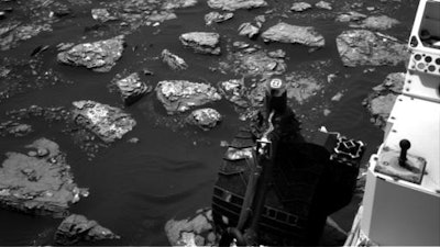 This Dec. 2, 2016 image taken by NASA's Curiosity rover shows rocky ground on the lower flank of Mount Sharp, a mountain on Mars. Curiosity landed on the red planet in 2012 and uncovered geologic evidence of an ancient environment that could have supported primitive life early in the red planet's history.