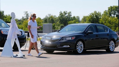 Cars that wirelessly talk to each other are finally ready for the road, creating the potential to dramatically reduce traffic deaths, improve the safety of self-driving cars and someday maybe even help solve traffic jams, automakers and government officials say.