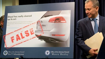 In this July 19, 2016, file photo, New York Attorney General Eric Schneiderman announces a lawsuit against Volkswagen in New York. A federal judge on Friday, Dec. 16, 2016, planned to hear whether Volkswagen, U.S. regulators and attorneys for vehicle owners had reached a deal for the remaining 80,000 cars caught up in the company’s emissions cheating scandal. U.S. District Judge Charles Breyer in San Francisco was set to get an update about the settlement talks.