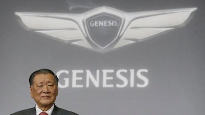 In this Wednesday, Dec. 9, 2015 file photo, Hyundai Motor Co. Chairman Chung Mong-koo attends a press unveiling of Genesis' new model EQ900 in Seoul, South Korea. Chiefs of Samsung Electronics and Hyundai Motor say their businesses face increased uncertainties due to growing protectionism.
