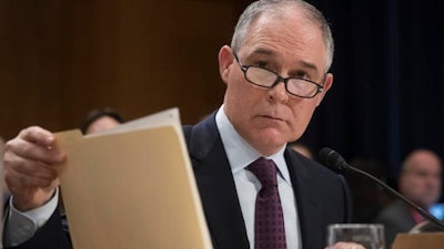 Environmental Protection Agency Administrator-designate, Oklahoma Attorney General Scott Pruitt is seen on Capitol Hill in Washington, Wednesday, Jan. 18, 2017, at his confirmation hearing before the Senate Environment and Public Works Committee.