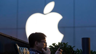 Apple Inc. has filed suit in China challenging Qualcomm Inc.’s fees for technology used in smartphones two years after Chinese regulators fined the chipmaker for its licensing practices. Two suits filed by the iPhone maker accuse Qualcomm of abusing its control over essential technology to charge excessive licensing fees, a Beijing court said on its microblog.