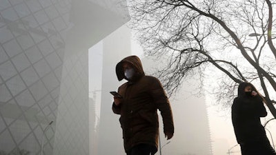 China's Ministry of Environment says an unspecified number of companies have violated measures meant to reduce smog as the country deals with a phase of particularly noxious pollution. Beijing has been on 'orange alert' the second highest pollution alert level since Friday. The alert was originally due to end on Sunday but authorities have extended it a further three days.