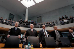 Martin Winterkorn, 2nd left front, former CEO of the German car manufacturer 'Volkswagen', and his lawyers arrive for a questioning at an investigation committee of the German federal parliament in Berlin, Germany, Thursday, Jan. 19, 2017.