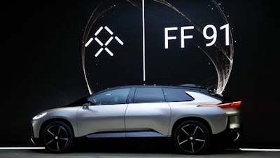 Faraday Future's FF 91 electric car is unveiled during a news conference at CES International on Tuesday, Jan. 3, 2017, in Las Vegas.