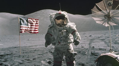 In this Dec. 12, 1972, photo provided by NASA, Apollo 17 commander Eugene Cernan stands on the moon. NASA announced that former astronaut Cernan, the last man to walk on the moon, died Monday, Jan. 16, 2017, surrounded by his family. He was 82.
