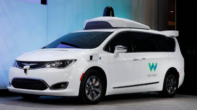 A Chrysler Pacifica hybrid outfitted with Waymo's suite of sensors and radar is shown at the North American International Auto Show in Detroit, Sunday, Jan. 8, 2017. Waymo is the autonomous vehicle company created by Google's parent company, Alphabet.