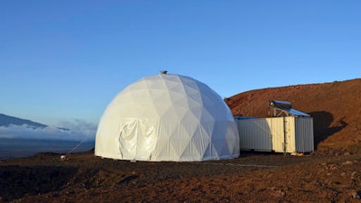 This April 25, 2013 photo provided by the University of Hawaii shows the domed structure that will house six researchers for eight months in an environment meant to simulate an expedition to Mars, on Mauna Loa on the Big Island of Hawaii. The group will enter the geodesic dome Thursday, Jan. 19, 2017, and spend eight months together in the 1,200 square foot research facility in a study called Hawaii Space Exploration Analog and Simulation (HI-SEAS). They will have no physical contact with any humans outside their group, experience a 20-minute delay in communications and are required to wear space suits whenever they leave the compound.