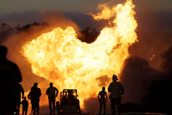 In this Sept. 9, 2010 file photo, a massive fire roars through a neighborhood in San Bruno, Calif. Pacific Gas & Electric Co. says it is prepared to pay the maximum fine of $3 million after a jury convicted the company of deliberately violating pipeline safety regulations before a deadly natural gas pipeline explosion in the San Francisco Bay Area and then misleading investigators looking into the blast.