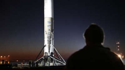 The SpaceX Falcon 9 rocket booster makes it's way into the port of Los Angeles Tuesday morning, Jan. 17, 2017. A SpaceX Falcon 9 rocket blasted off from California on Saturday, Jan. 14 and placed a constellation of satellites in orbit, marking the company's first launch since a fireball engulfed a similar rocket on a Florida launch pad more than four months ago.