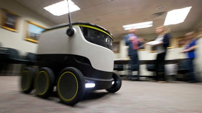 The Starship Technologies delivery robot goes through it's paces during a demonstration at the Capitol in Richmond, Va., Wednesday, Jan. 25, 2017. State lawmakers have partnered with European company Starship Technologies on bills that would allow Virginia cities to join two others in the U.S. and many across Europe where the company is testing the robots. Much like big-time retailers' attempts at drone deliveries, the robots aim to revolutionize the way people get their parcels.