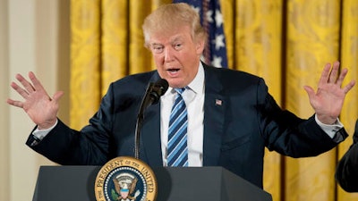 In this Sunday, Jan. 22, 2017, file photo, President Donald Trump speaks during a White House senior staff swearing-in ceremony in the East Room of the White House, in Washington. Trump’s economic plans are nothing if not ambitious. Yet even to come anywhere near his goals, economists say Trump would have to surmount at least a half-dozen major hurdles that have long defied solutions.
