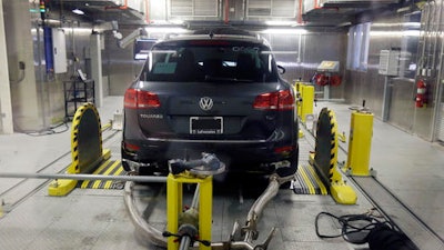 In this Oct. 13, 2015, file photo, a Volkswagen Touareg diesel is tested in the Environmental Protection Agency's cold temperature test facility in Ann Arbor, Mich.