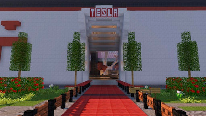 This photo shows a scene from a video game featuring a Tesla gigafactory.