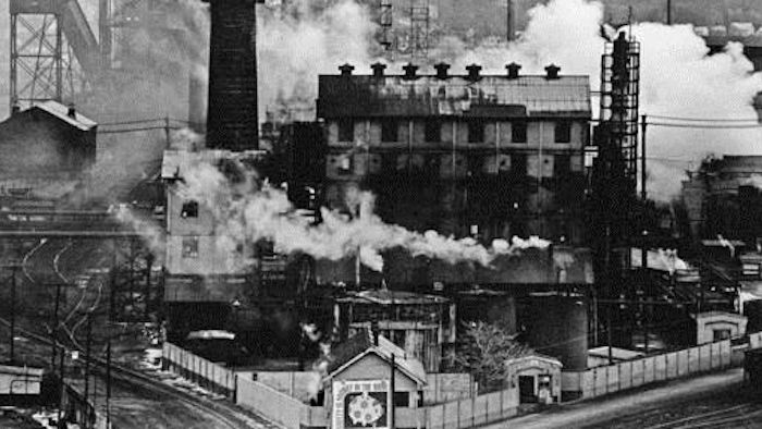 In this September 1980 file photo, a Jones and Laughlin Steel Corp. coke plant is wreathed in smoke and steam in Struthers, Ohio. Republican Ohio Gov. John Kasich has made it his mission to send Ohio's 'Rust Belt' label to the scrap heap of history, but it's been repeated and entrenched over more than 30 years since the steel industry's devastation in the 1970s and 1980s by foreign competition and environmental regulation, leaving behind abandoned, rusting mills and unemployment.