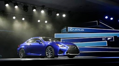 In this Jan. 14, 2014 file photo, the Lexus RC F Coupe is unveiled at the at the North American International Auto Show in Detroit. Technology glitches including Bluetooth phone pairing and misunderstood voice commands dented car and truck reliability scores in a major survey of automobile owners. Lexus and Porsche tied for the top spot, leading all brands for dependability in the survey released Wednesday, Feb. 22, 2017, by the consulting firm J.D. Power.