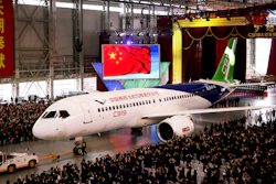 In this file photo, the first twin-engine 158-seat C919 passenger plane made by The Commercial Aircraft Corp. of China (COMAC) is pulled out of the company's hangar near the Pudong International Airport in Shanghai.