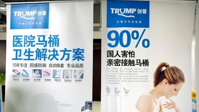 In this Monday, Feb. 13, 2017 photo, banners advertising the high-end Trump-branded toilets made by Shenzhen Trump Industrial Co. are on display at the company's offices in Shenzhen in southern China's Guangdong Province. U.S. President Donald Trump is poised to receive something that he had been trying to get from China for more than a decade: trademark rights to his own name. After suffering rejection after rejection in China's courts, he saw his prospects change dramatically after starting his presidential campaign.