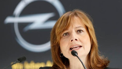 In this Jan. 27, 2014 file photo CEO of General Motors Mary Barra speaks during a press conference at the Opel car factory in Ruesselsheim, Germany. French automaker PSA Group said Tuesday, Feb. 14, 2017 it is in talks that could lead to acquisition of GM's Opel division.
