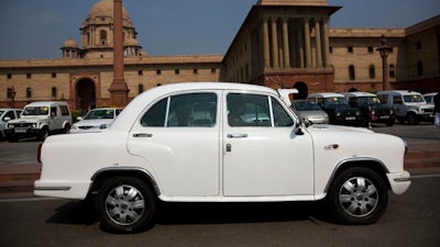 Hindustan Ambassadors car is parked outside the Secretariat Building in New Delhi, India, Monday, Feb. 13, 2017. First manufactured in 1948, the Ambassador was the only luxury car available in India till the mid-1980s. By the early 1990's, economic reforms had opened India's doors to many small car manufacturers.