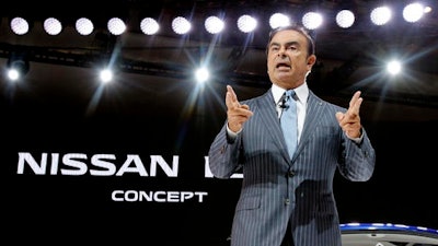 In this Oct. 28, 2015, file photo, Nissan Motor Co. Chief Executive Carlos Ghosn delivers a speech during the Japanese automaker's presentation at the Tokyo Motor Show in Tokyo. Ghosn, who leads Nissan and Renault, has tapped Hiroto Saikawa, a veteran Japanese executive at Nissan, to replace him as chief executive at the Japanese automaker, although Ghosn will stay on as chairman. Nissan, based in Yokohama, made the announcement in a statement Thursday, Feb. 23, 2017. The appointment, effective April 1, will be up for shareholders' approval in June.