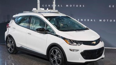 In this photo, a self-driving car is seen in Detroit. General Motors is trying to persuade state lawmakers across the country to pass legislation that would clear the way for the automaker to make self-driving cars publicly available while potentially barring GM’s competitors from putting their own vehicles on the road.