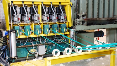 A strapping machine built by Signode Industrial Group.