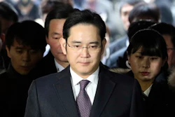 In this Jan. 18, 2017, file photo, Lee Jae-yong, front, a vice chairman of Samsung Electronics Co. arrives for the hearing at the Seoul Central District Court in Seoul, South Korea. South Korean prosecutors say they will indict Lee on bribery, embezzlement and other charges linked to a political scandal that has toppled President Park Geun-hye.